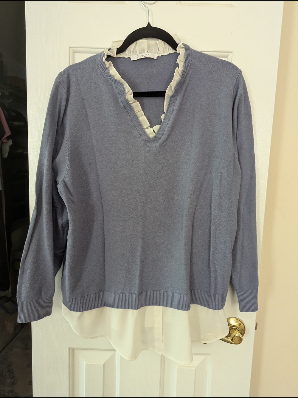 Sioni Light Blue V-Neck Sweater with White Ruffle Trim